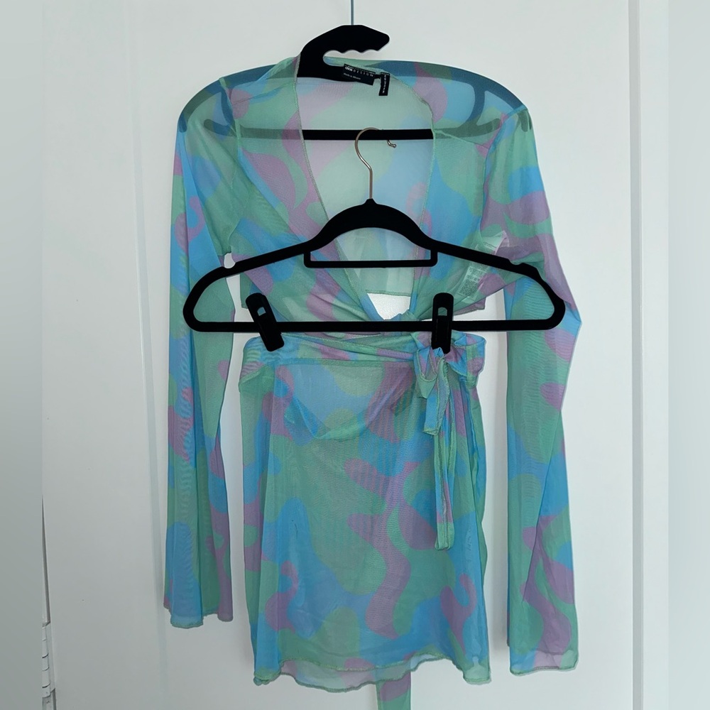 Mesh top tie and a skirt. Top size 10 skirt size 8